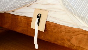 The flat plate on the babybay attaches to the opposite side of the...