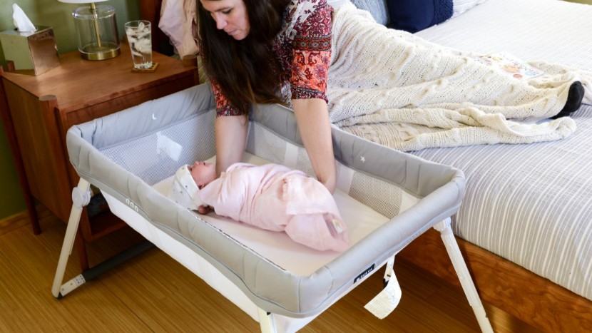 lotus bassinet - you can reach inside the lotus while still in bed, but it is more...