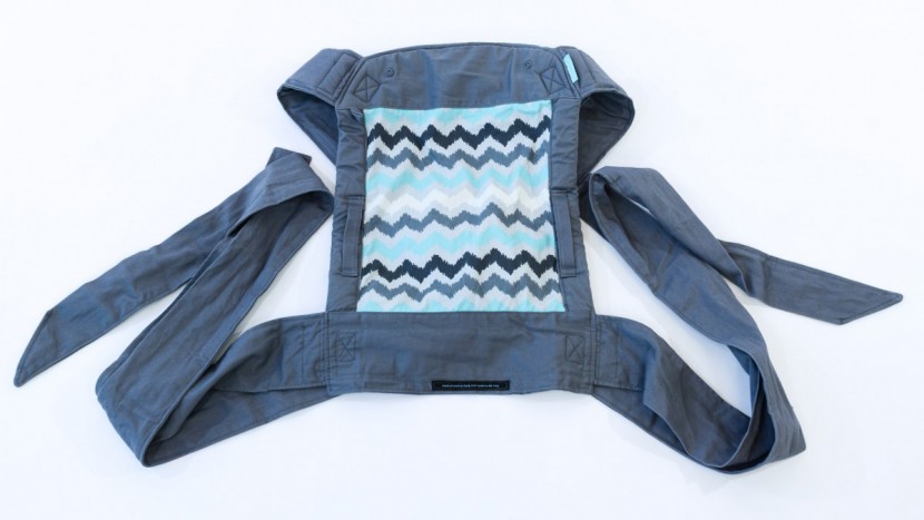 infantino sash - the sash is machine washable but needs to hang for drying. it is not...