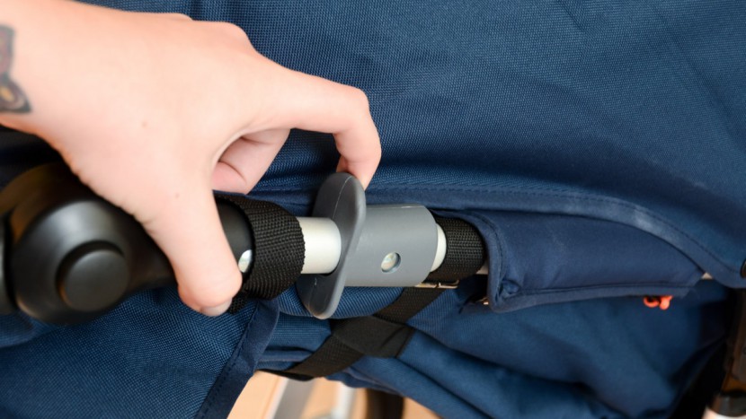 the speed fold is initiated by releasing the stroller lock and...