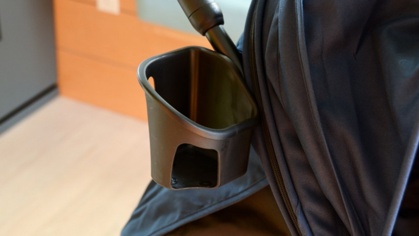 the side parent cup holder on the zoe is relatively shallow and...