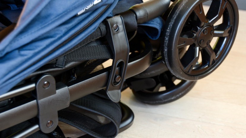 the zoe has an automatic lock that works well and holds the stroller...