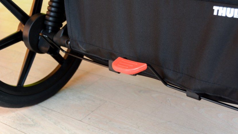 the rear pedal on the urban glide double is easy to use and works...