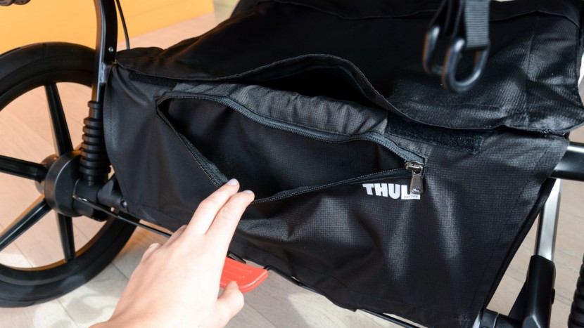 the urban glide 2 double has a large storage bin with a zippered...