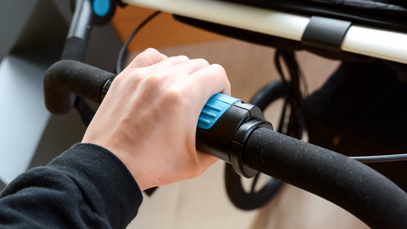 the new urban glide double has a handbrake that twists to slow the...