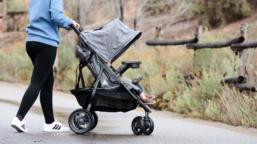 joovy scooterx2 with tray - the scooter's dual front wheels on each leg and plastic construction...