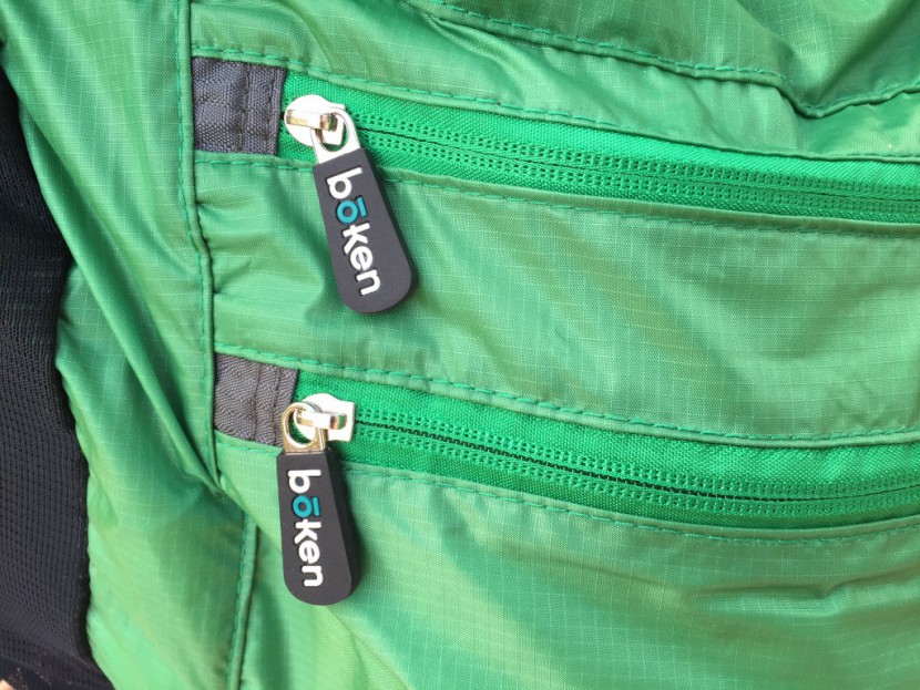 a close up of the sturdy metal hardware on the boken every day bag;...