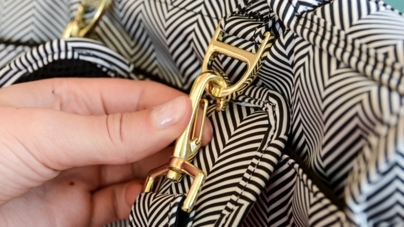 the clasp makes it easy to remove straps for alternate carry styles.