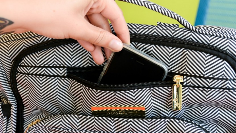 this photo shows the padded tech pocket for your phone.