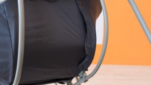 It can be a bit difficult to pull the fabric tight enough around the...