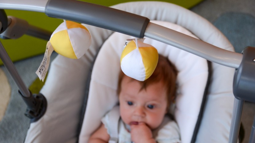 graco slim spaces - baby can sit up and look in on the action while mom gets things done...