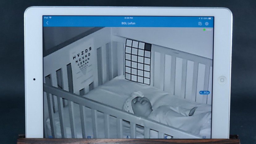 the zoom feature on the lefun will allow you to see your baby's eyes...