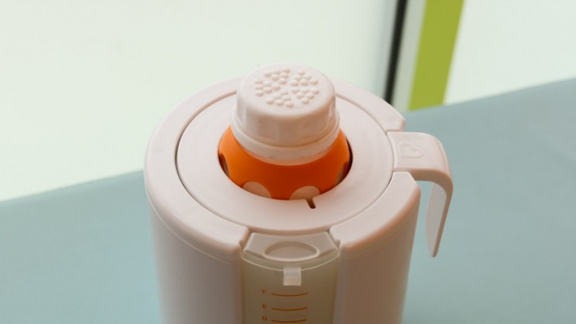 the munchkin works with a variety of bottle shapes, though taller...