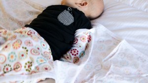 The Miracle Blanket has various flaps of fabric that help keep the...