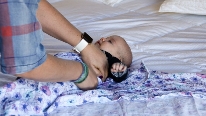 wrapping up our baby tester annie tight in the aden + anais classic...