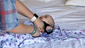 Wrapping up our baby tester Annie tight in the Aden + Anais Classic...