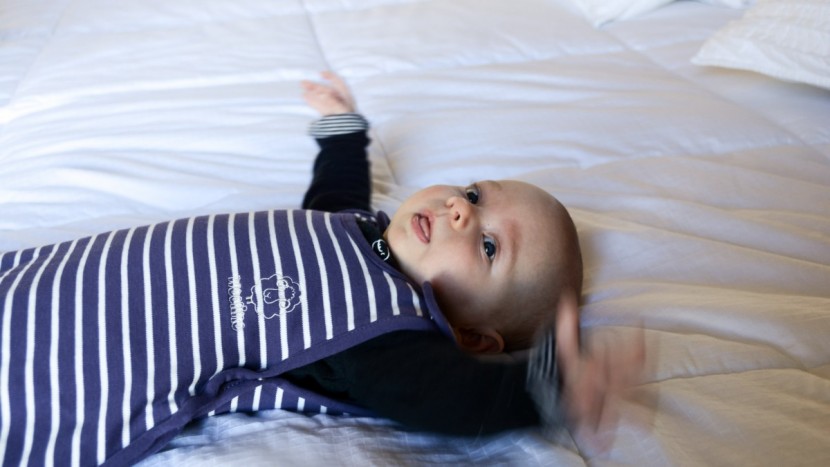swaddle and sleep sack - the woolino is made for babies as young as 2 months who are...