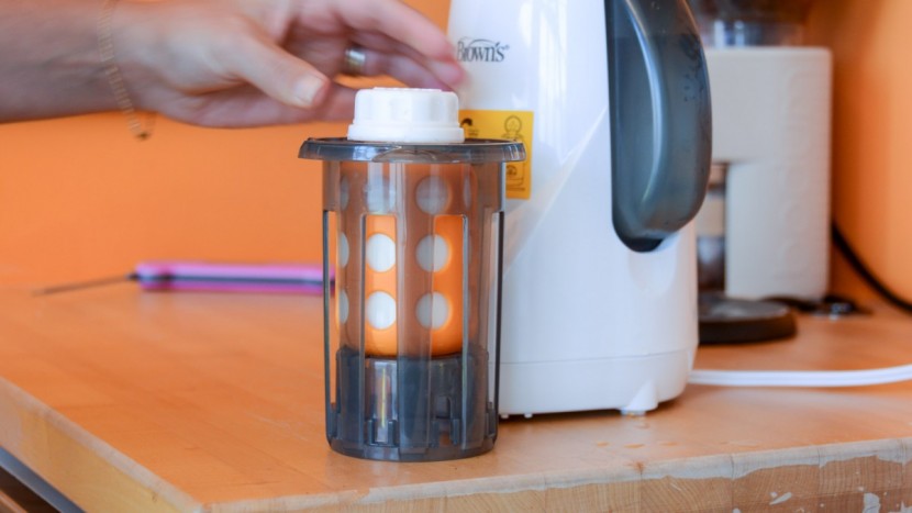 bottle warmer - some warmers have a removable basket that can help you avoid contact...