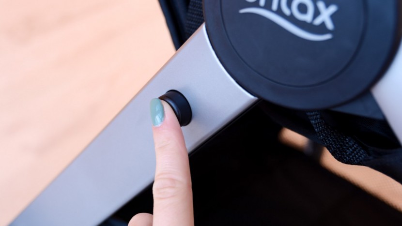 the safety release button on the b-lively allows you to fold the...