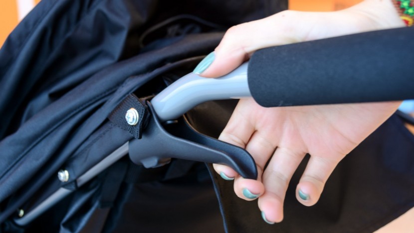 the rambler fold initiates with two hands on dual side levers.