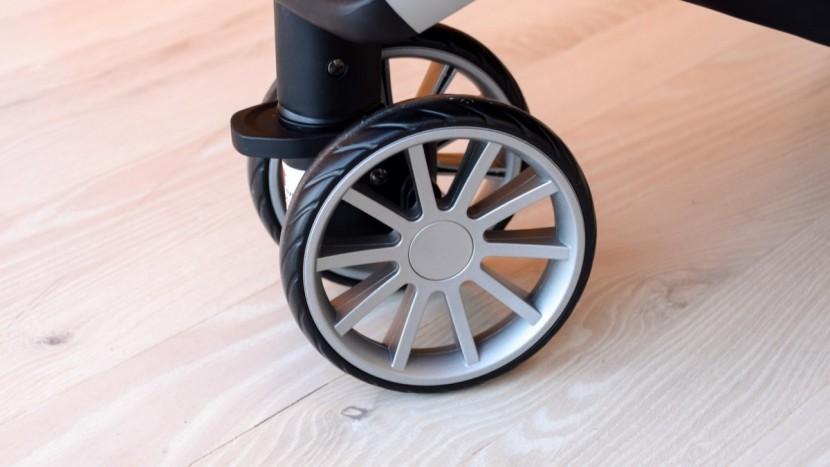 the b-lively has foam filled plastic wheels and a dual wheel design...