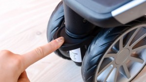 You can lock the front wheels on the B-Lively in place by pressing a...