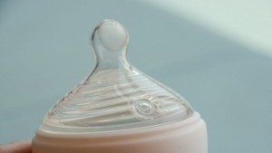 The single nipple vent is meant to be placed under baby's nose while...