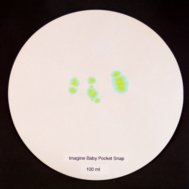 imagine baby pocket snap - the imagine baby pocket snap shows minimal green (mock urine) on the...