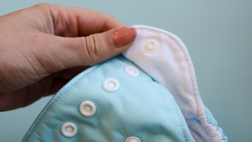 thirsties newborn all in one - the single row of snaps was enough for us to feel like we could get...