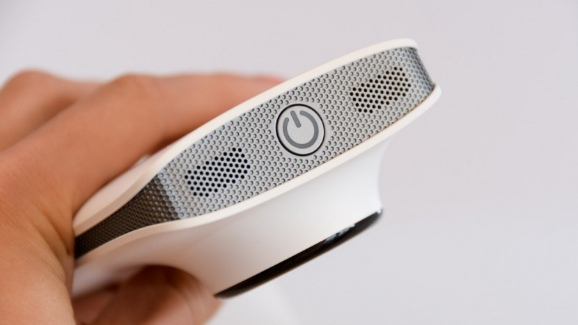 the miku has speakers and an on/off button on the top of the monitor.