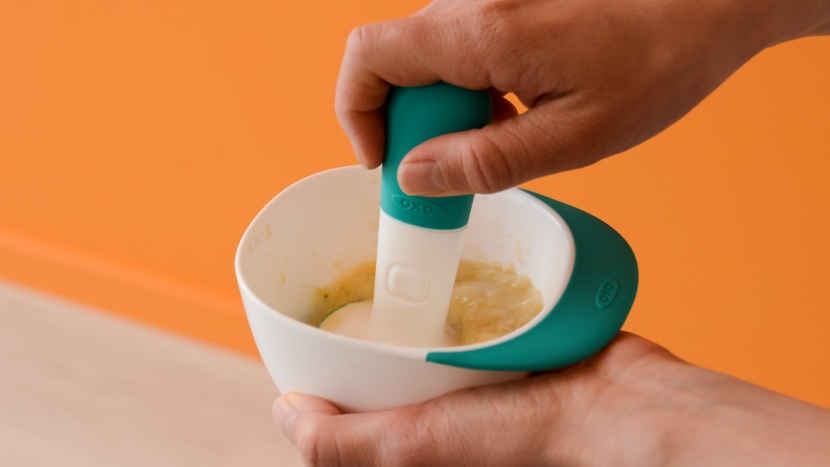oxo tot food masher - the oxo has non-slip grip on the masher and on the lip of the bowl...