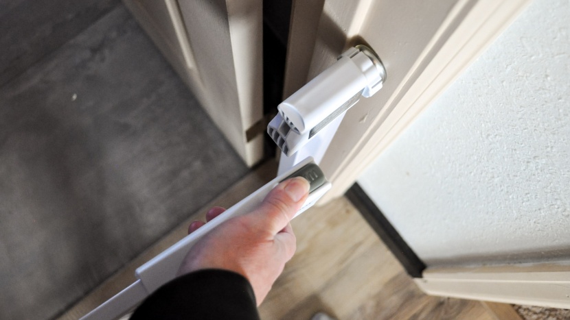 baby gate - the cumbor latch is fairly easy to use with one hand unlike some of...