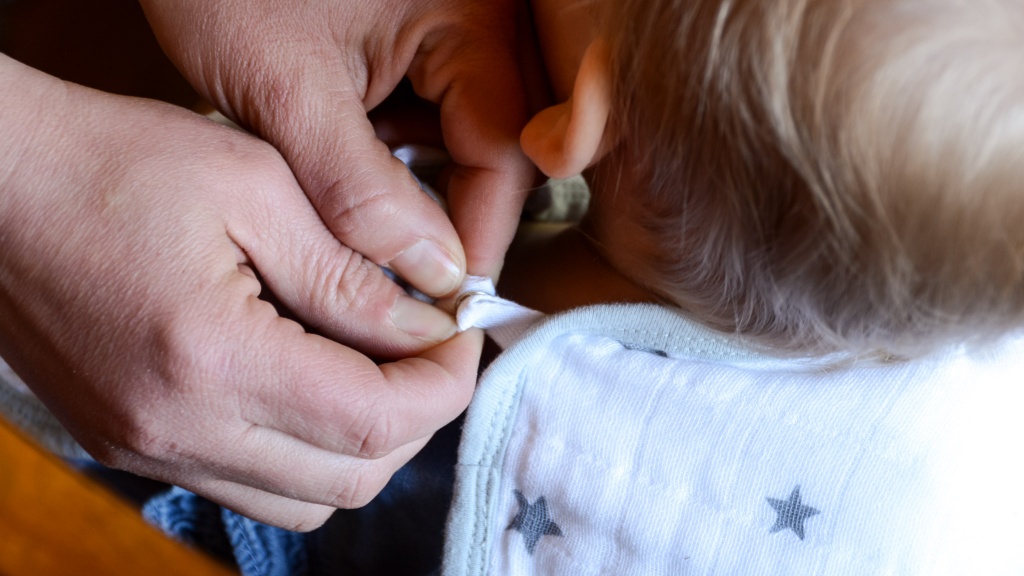 baby bib - the aden + anais burpy bib only has one snap setting.