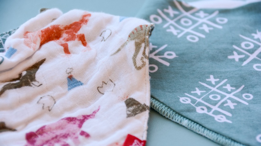 baby bib - the nuby reversible muslin teething bib (left) and the matimati...