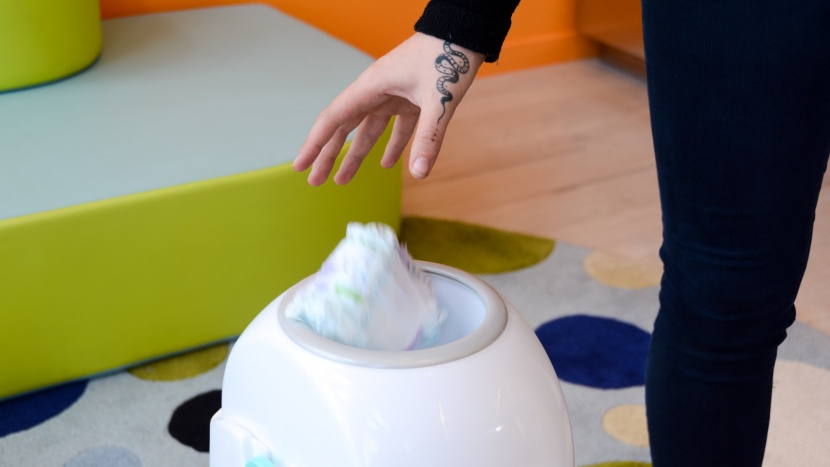 the generously sized opening of the creative baby tidy allows...