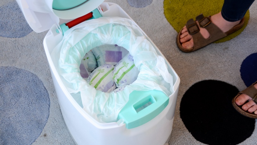 when you open the lid of the creative baby tidy, you are hit full...