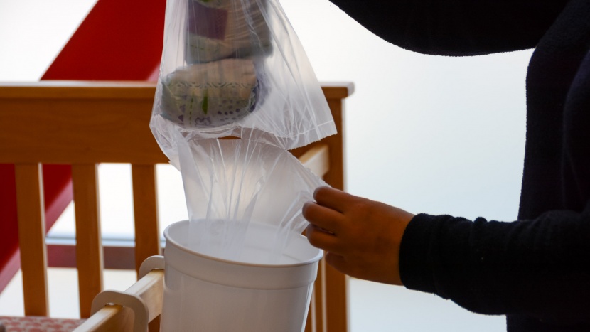 diaper one-n-done - removing the bag and replacing it with a new liner is a very simple...