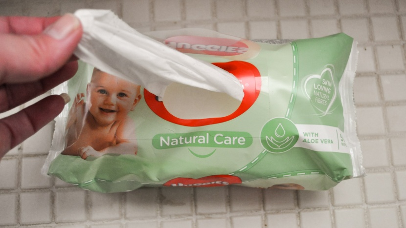 baby wipes - the huggies package is easier to use with one hand than most of the...