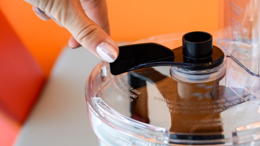the bowl scraper is easy to move and is operable while the food...
