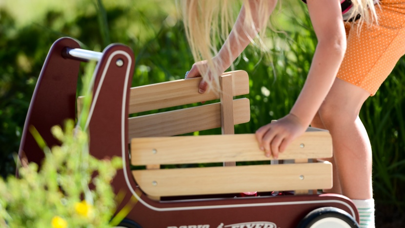 the wood slats on the side of the radio flyer are easily removable...