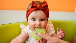 It may take a few attempts before your baby learns how to hold and...