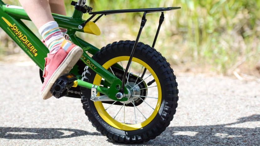 kids pedal bike - the rack on the back of the tomy made it a big hit with our little...