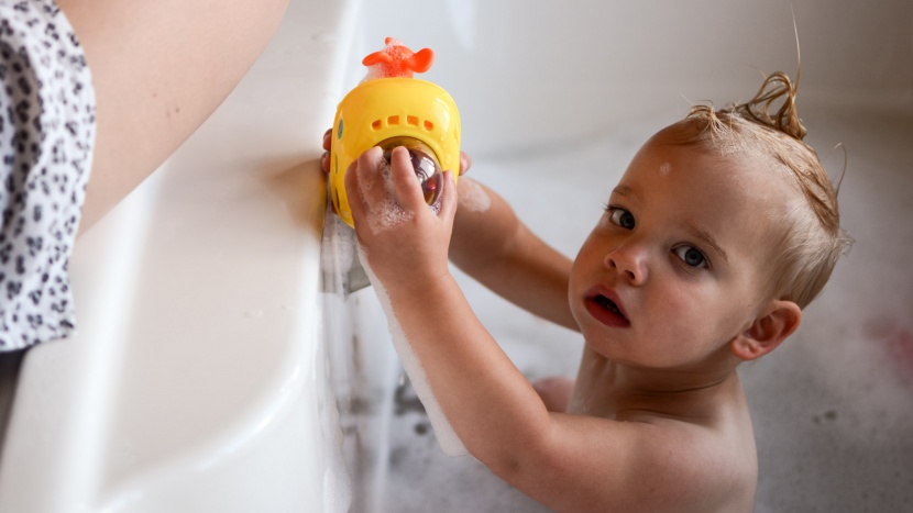 bath toy - with a pull of the string to activate the propeller, the skip hop...