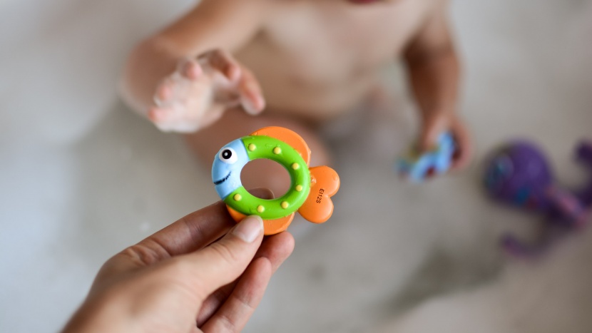 bath toy - the nuby floating octopus with 3 hoopla rings has three smaller...