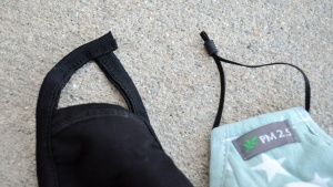 The Burlway strap on the left has an unfinished edge that testers...