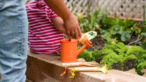 The Kinderific Gardening Set and Watering Can includes a metal can...