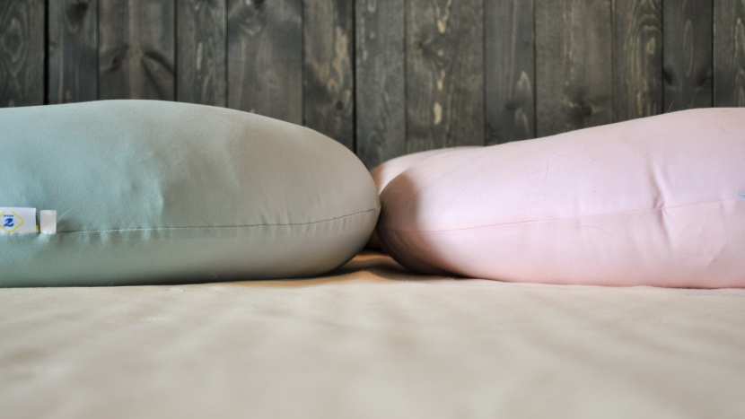 pregnancy pillow - the pharmedoc c (on the right) is noticeably thinner and the padding...