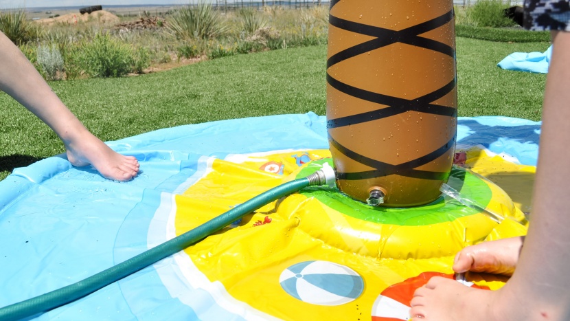 the water hose connects to the bottom of the tree and fills the...