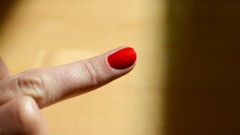 the color "paint the town red" by ella+mila is a bright poppy that...