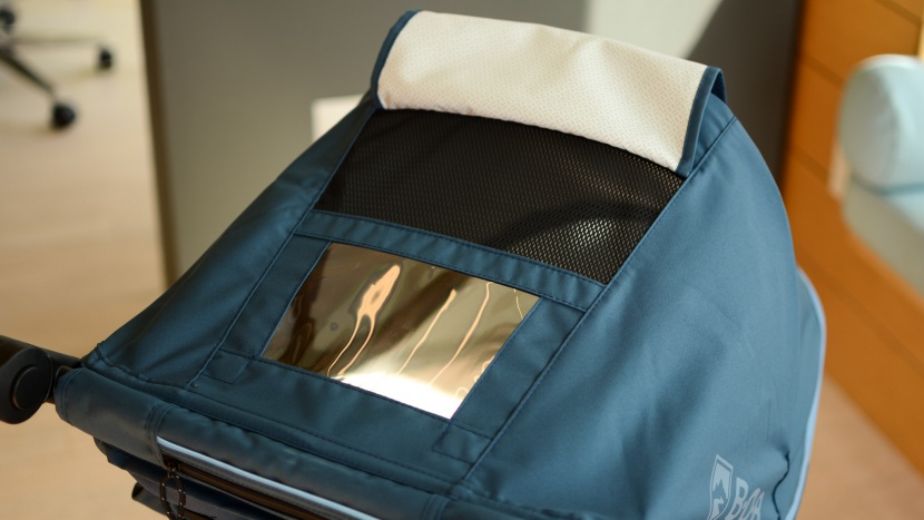 bob alterrain pro - the pro has a vinyl peek-a-boo window and mesh for ventilation.